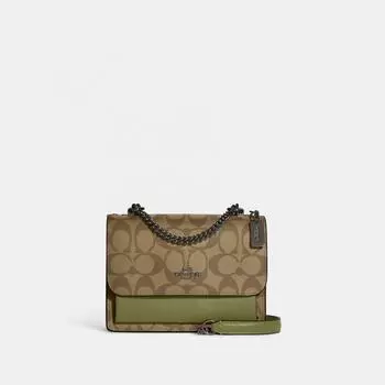 Сумка через плечо Coach Mini Klare из канвы Signature