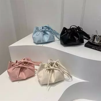 Сумка через подмышку для женщин, новый нишевый дизайн, высококачественный бант, модная сумка-ведро для поездок на работу на одно плечо