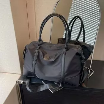 Сумка для багажа через плечо для деловых поездок, женская, большой емкости, 2024, новая модная тканевая сумка, высокочувствительная, портативная, для путешествий на короткие расстояния чёрный