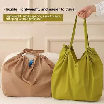 Сумка для хранения большой вместимости с плечевым ремнем. Прочная несущая конструкция, устойчивая к разрывам. Складная конструкция. темно-синий