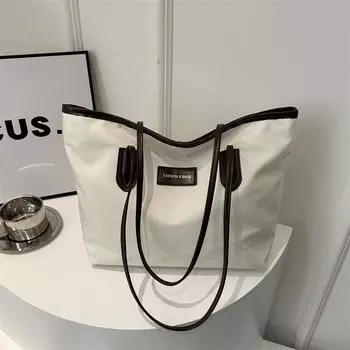 Сумка для поездок на работу из ткани Оксфорд, подходящая по цвету, большой вместимости, весна 2024, новая повседневная сумка через плечо с простой текстурой чёрный