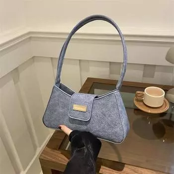 Сумка-ниша французского стиля с текстурой иностранного стиля 2024 года, новая женская сумка, однотонная, популярная сумка-багет через плечо под мышкой чёрный