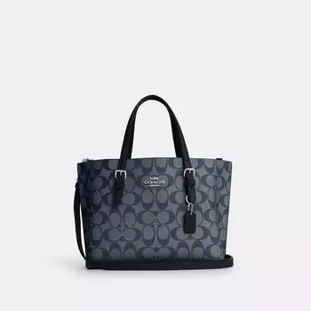 Сумка-тоут Coach Mollie 25 из канвы Signature серебристого цвета, темно-синего цвета из денима