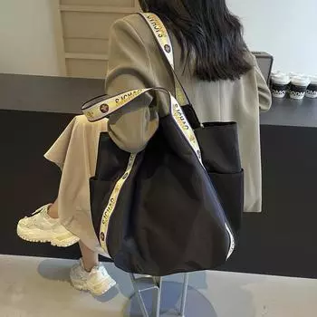 Сумка-тоут из холста для женщин, большая вместимость, 2024, новая универсальная повседневная сумка через плечо, студенческая сумка для поездок на работу чёрный