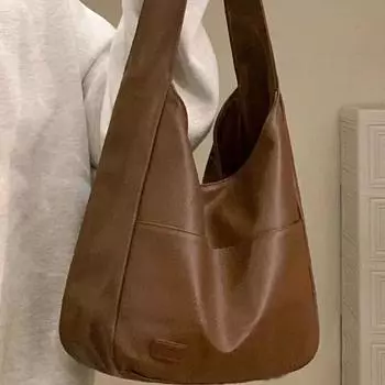 Сумка-ведро из мягкой кожи — осенне-зимний вариант для студентов и пассажиров коричневый