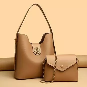 Сумка-ведро с ромбовидным инкрустированным металлическим логотипом и узором личи для женщин. Универсальная сумка-конверт с цепочкой в стиле ретро. Новая минималистичная сумка для матери и ребенка 2024 года.