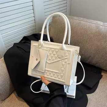 Сумки2024 Новая сумка для матери и ребенка Высококачественная сумка-тоут Модная универсальная сумка Нишевая сумка через плечо для женщин белый