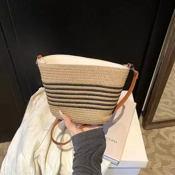 Summer straw woven small bag women s 2025 new seaside vacation woven bag casual versatile messenger bucket bag