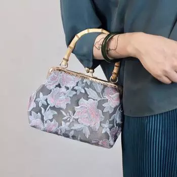 Сумочка-клатч с застежкой-замком «поцелуй» из металла и бамбуковой ручкой 27*7.5*11cm бронзовый