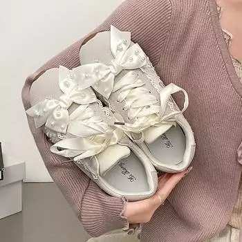 Супер красивые ретро-кроссовки с жемчужным бантом на плоской подошве, женские, новая весенняя универсальная повседневная спортивная обувь 2025 года 35 бежевый