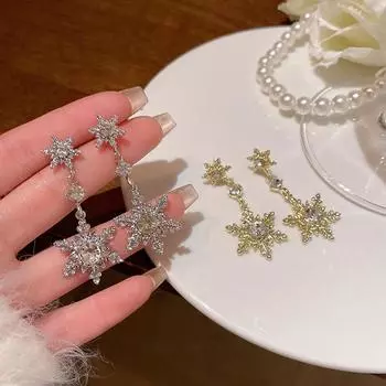 Супер вспышка света роскошные передовые ощущения универсальные полностью имитация циркония длинные кисточки снежинки серьги для женщин 1 pair золотистый