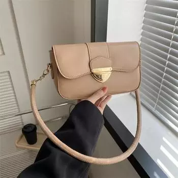 Темперамент популярная сумка-сумка с замком на подмышке 2024 года новая женская сумка через плечо универсальная корейская версия сумки чёрный