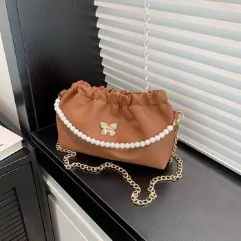 Textured retro versatile bucket bag fashionable niche chain bag women s spring shoulder messenger commuter bag чёрный