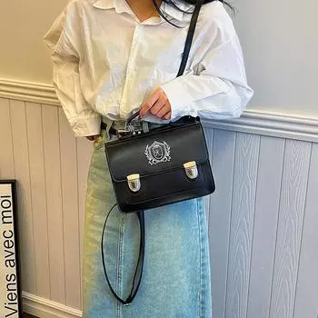 Текстурированный ретро женский небольшой рюкзак 2024 новый иностранный стиль универсальная сумка для поездок на работу популярная дорожная сумка чёрный