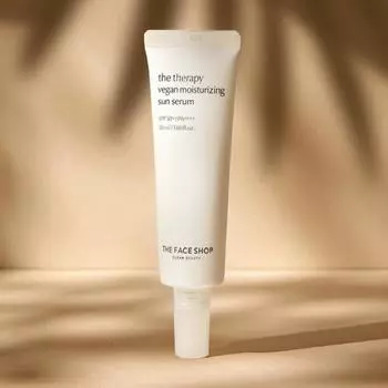 The Face Shop The Therapy Vegan Увлажняющая солнцезащитная сыворотка 50 мл SPF50+ PA++