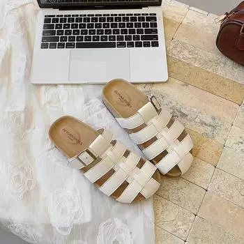 Thick-soled hollowed-out woven bag head Roman slippers women s 2025 new retro versatile one-pedal beach cool slippers 35 серебряный