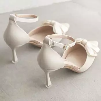 Thin heel hollow fairy single shoes 2024 summer new niche design bow one-word buckle strap high heels women 34