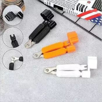 Три в одном: многофункциональная катушка для смены струн на гитаре чёрный