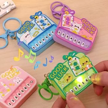 Творческий мультяшный мини-пианино брелок ладонь музыка электронное пианино светящиеся игрушки сумка подвеска ловец машинка детские игрушки зелёный