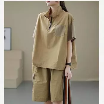 Удобный комплект из двух предметов: однотонные свободные шорты и топ на молнии. L