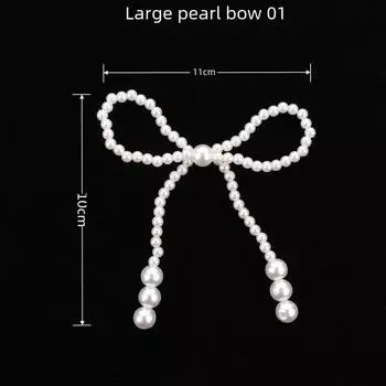 «Украшение в виде цепочки-банта из жемчуга своими руками для тортов и головных уборов»