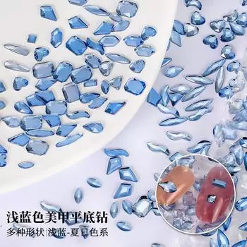 Украшения для нейл-арта своими руками из голубых бриллиантов особой формы, синих каплевидных бриллиантов особой формы с плоским дном.