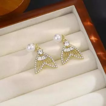 Уникальные и изысканные серьги в виде хвоста русалки с первоклассным и утонченным стилем