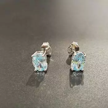 Уникальные овальные серьги-гвоздики из серебра 925 пробы с небесно-голубым цирконием для женщин небесно-голубой