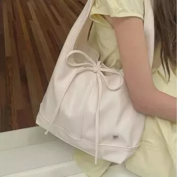 Универсальная женская сумка-тоут для поездок на работу из Кореи 2025 года: Большая вместимость, повседневный дизайн с французским бантом на плече слоновая кость