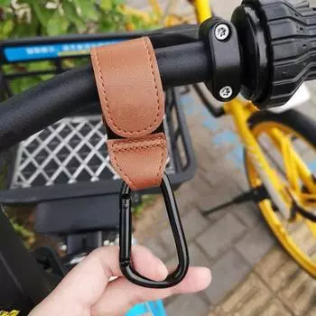 Универсальный зажим с крючком для детской коляски с крепежной лентой Прочная несущая нагрузка Регулируемая конструкция Легко устанавливается Подвесной крючок Аксессуары для ремня коляски чёрный