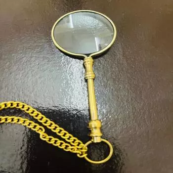 Увеличительное стекло из латуни с латунной ручкой и латунной цепочкой как