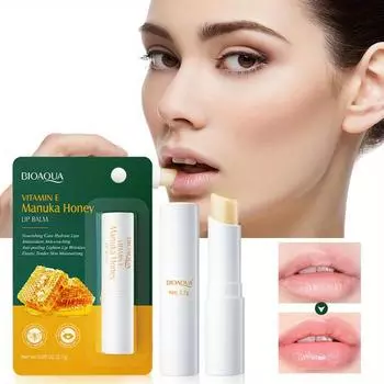 Увлажнение губ с медом и витамином Е. Увлажнение. Уменьшение морщин на губах и предотвращение сухих трещин. 2.7g