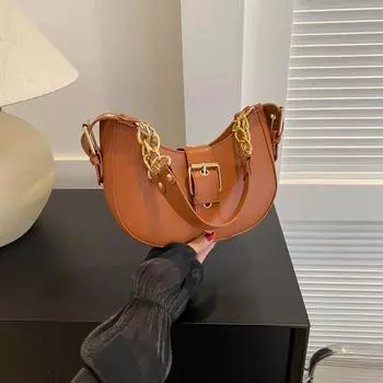 В этом году популярны новые модели 2024 года, нишевые сумки для женщин в иностранном стиле на лето, универсальные широкие плечевые ремни, сумки-мессенджеры темно-коричневого