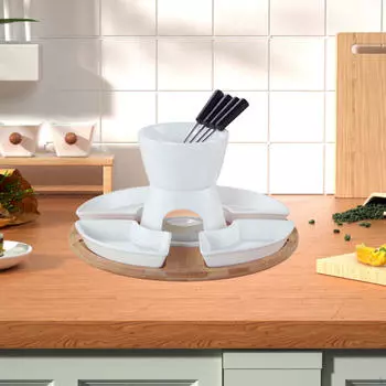 В комплект входит бамбуковый поднос с набором для фондю для сыра и шоколада white