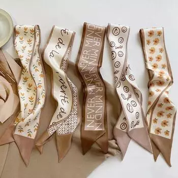 В комплекте с небольшим шелковым шарфом, женской резинкой для волос и узкой лентой.