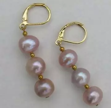 Великолепная пара причудливых сережек с розовым и фиолетовым жемчугом Южных морей.