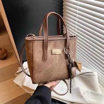 Весенне-летняя вместительная женская сумка-ведро 2025 года, белая с кофейным оттенком, сумка через плечо из кожи