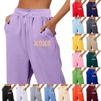 Весенние и однотонные принтованные модные женские повседневные брюки с карманами и шнурком L чёрный