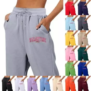 Весенние и однотонные принтованные модные женские повседневные брюки с карманами и шнурком L чёрный