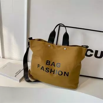 Вместительная сумка-тоут из холста с буквенным принтом, новая модная большая сумка для поездок на работу, фактурная сумка-мессенджер на одно плечо. чёрный