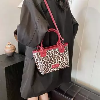 Внешняя сумка с леопардовым принтом для женщин, переносимая одной рукой, новинка 2024 года, модная сумка-ведро, нишевая сумка-мессенджер высокого класса, иностранная повседневная сумка-мессенджер чёрный
