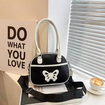 Внешняя торговля Ручная женская сумка 2024 Весна/Лето Новая мода на одно плечо Сумка через плечо в европейском и американском стиле Контрастный цвет с бантом Маленький