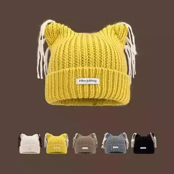 Вязаная шапка для женщин 2024 года, новая осенне-зимняя корейская версия, универсальная, милая вязаная шапка с кисточками и кошачьими ушками, теплая шапка для защиты ушей 56-58cm чёрный