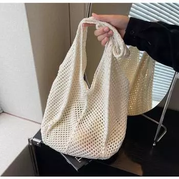 Вязаная сумка женская 2024 новая нишевая сумка через плечо с полым дизайном большая вместительная повседневная сумка-тоут