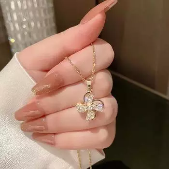 Вращающееся маленькое ожерелье-ветряная мельница, женская легкая роскошь, ощущение высокого класса, простой темперамент, кулон, слегка инкрустированный цирконом.