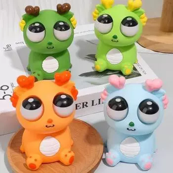 Выскакивающий глаз дракона сжимает игрушку для снятия стресса и беспокойства сидящий мультяшный дракон щипок синий