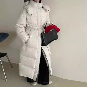 Высококачественная белая утиная пуховая куртка длинная женская зимняя 2024 года утолщенная модная талия и тонкое нишевое пальто до колена One size слоновая кость