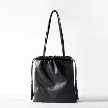 Высококачественная сумка-тоут с кисточками и шнурком, модная кожаная сумка через плечо, сумка через подмышку, повседневная женская сумка-ведро 28x3x31cm чёрный