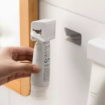 Выжималка зубной пасты Привлекательность Ручной выжимной зубной пасты Зажим для зубной пасты Аксессуары для ванной комнаты Настенный Экономия труда