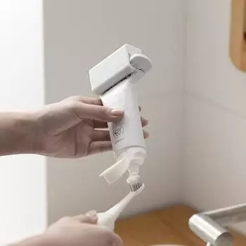 Выжималка зубной пасты Привлекательность Ручной выжимной зубной пасты Зажим для зубной пасты Аксессуары для ванной комнаты Настенный Экономия труда